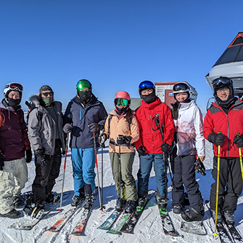 Dr. Yang skiing with his friends